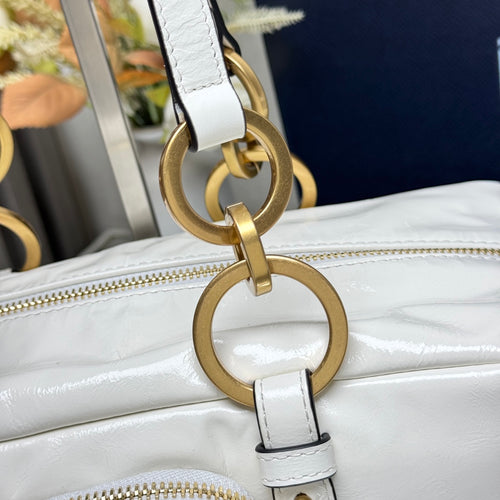 Prada Pre-Owned
2025 Medium Leather Dangle Top Handle Bag shoulder bag