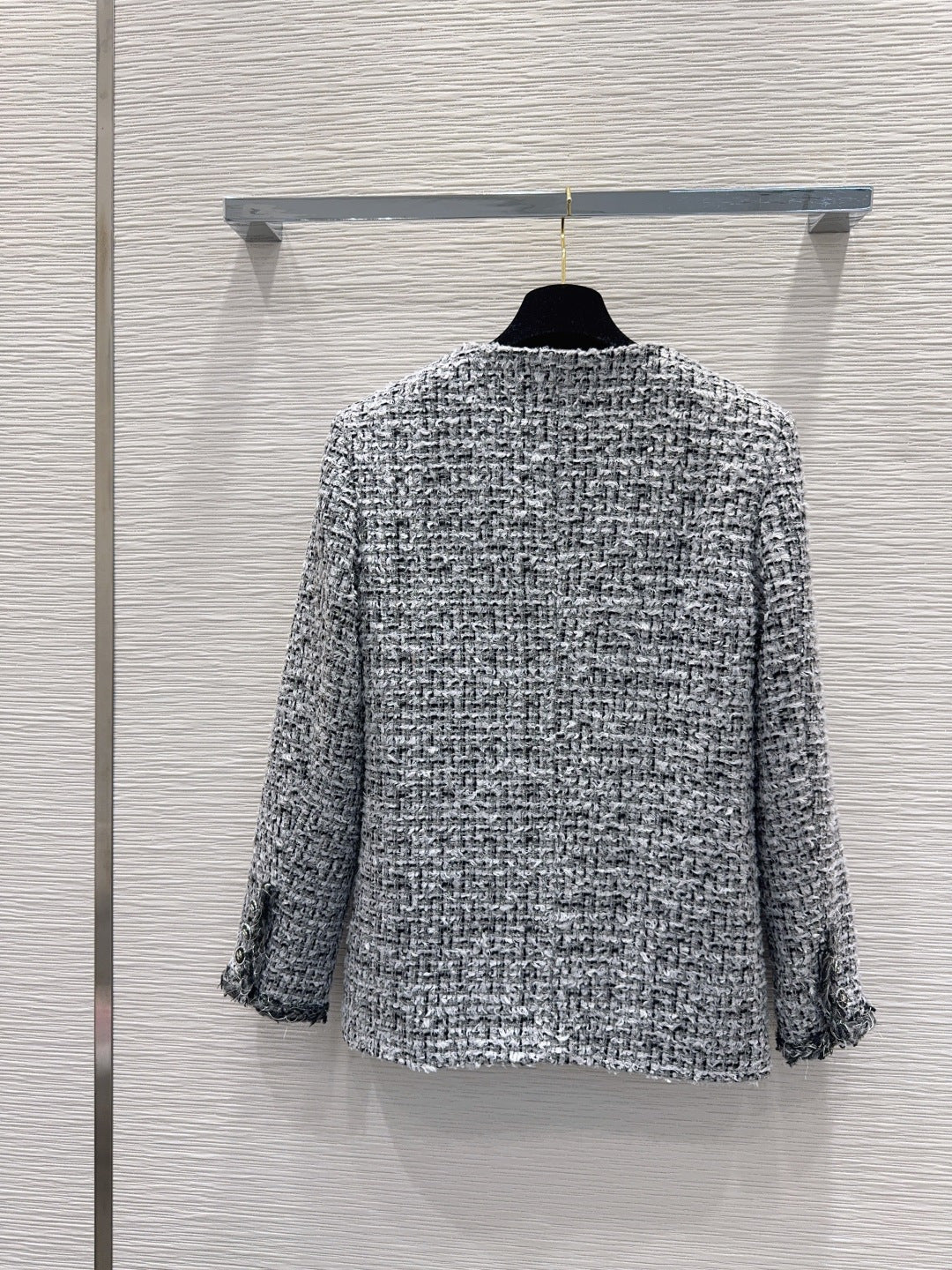 gray and black woven tweed jacket