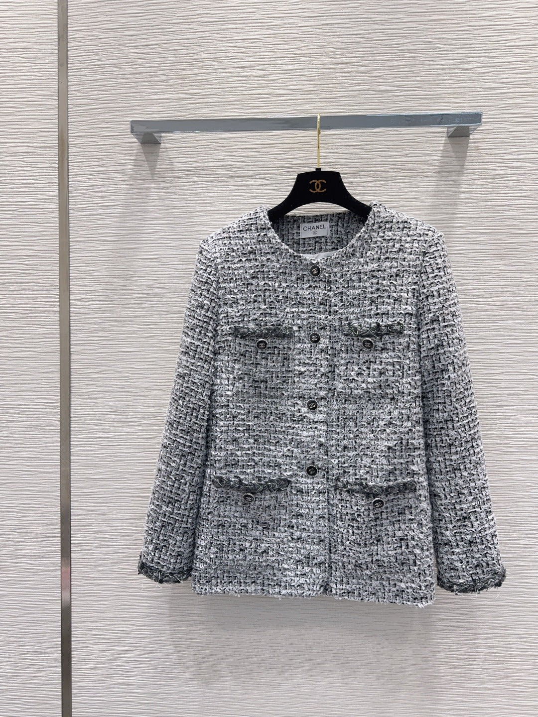gray and black woven tweed jacket