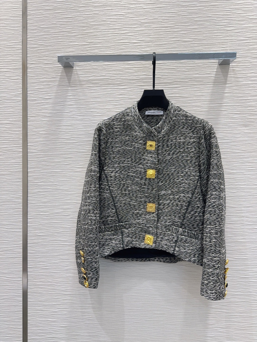 Cardigan Jacket in heathered grey jersey enhanced with distinctive gold-tone anatomical snap buttons