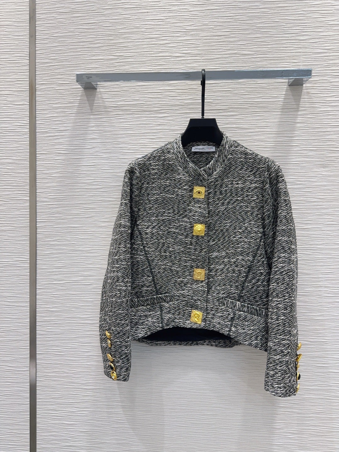 Cardigan Jacket in heathered grey jersey enhanced with distinctive gold-tone anatomical snap buttons