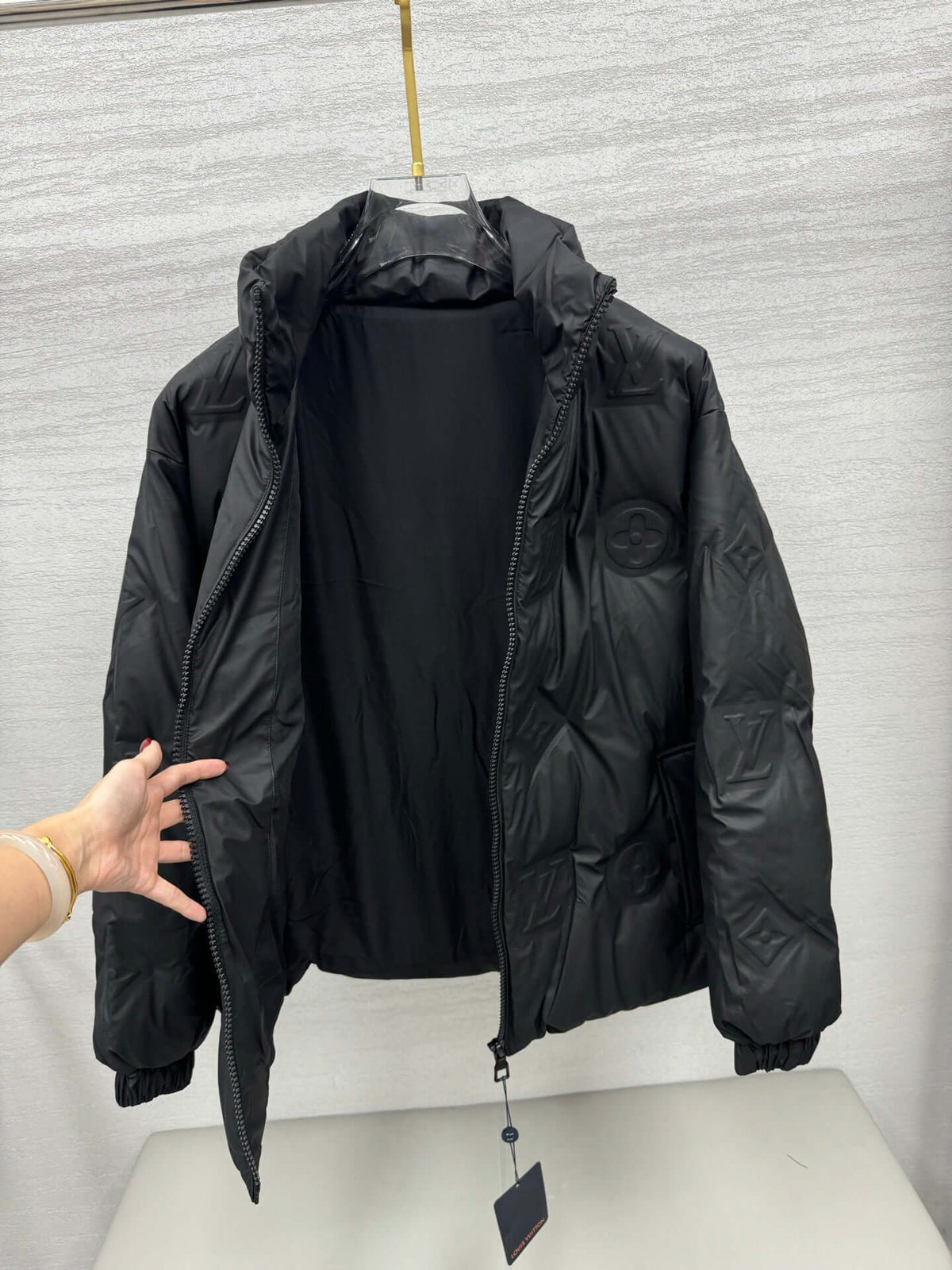 black Louis Vuitton puffer jacket - Styledbyblazz