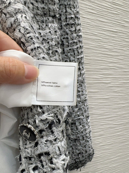 gray and black woven tweed jacket - Styledbyblazz