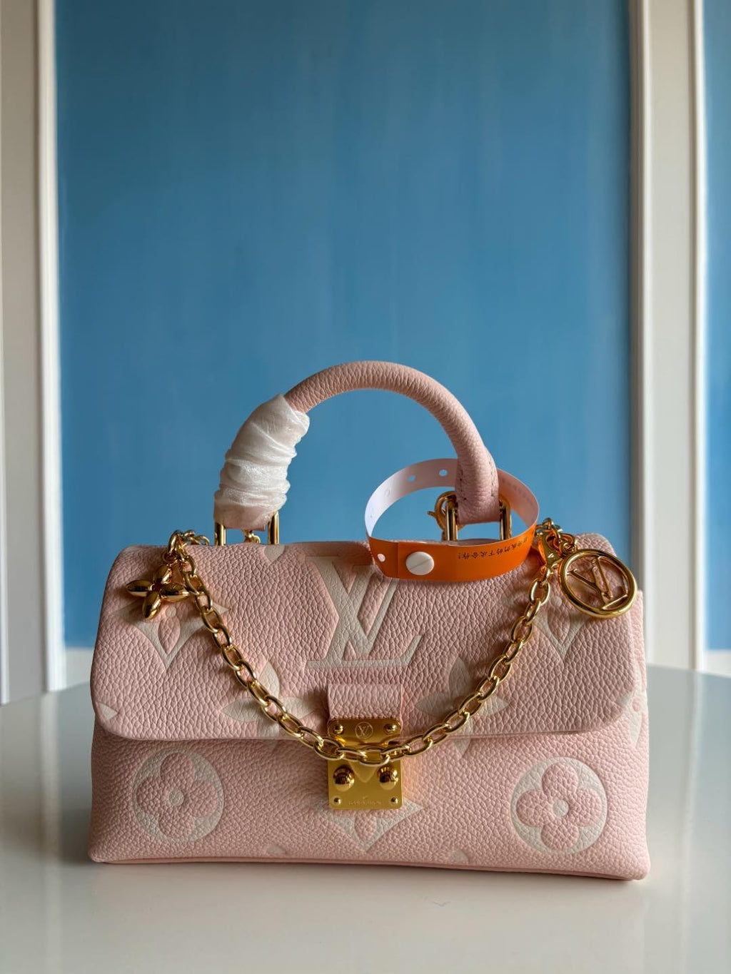 Louis Vuitton Empreinte Monogram Giant Madeleine Nano Rose White Quartz - Styledbyblazz